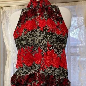 Red/black floral halter top with ruffle hem and tie back. Size M IZ Byer